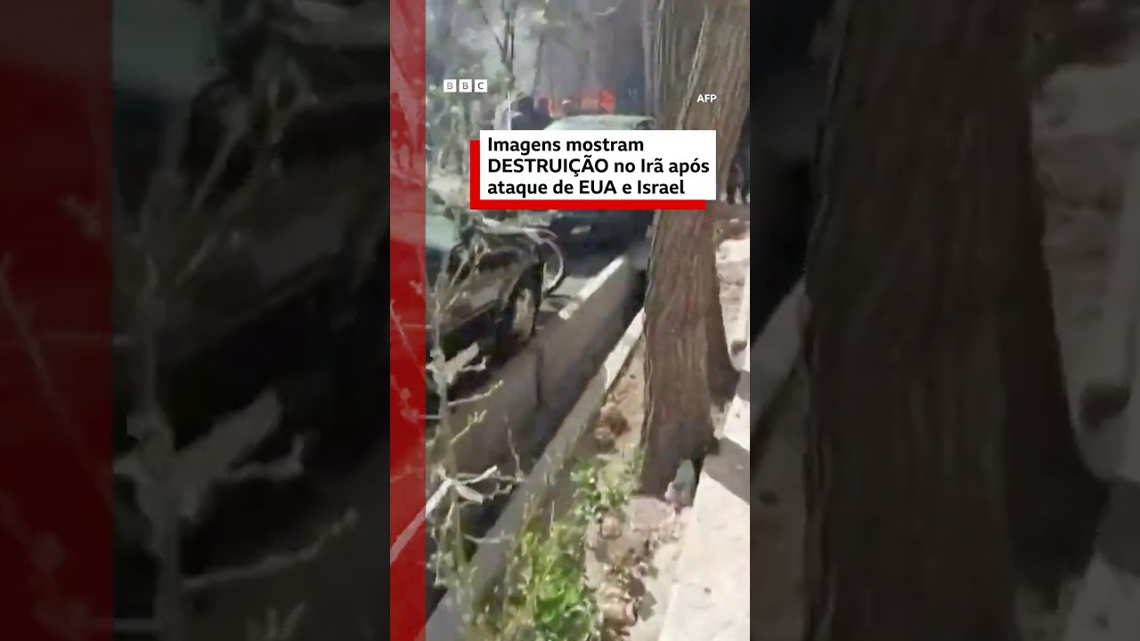 Carros queimados e prédios destruídos no Irã