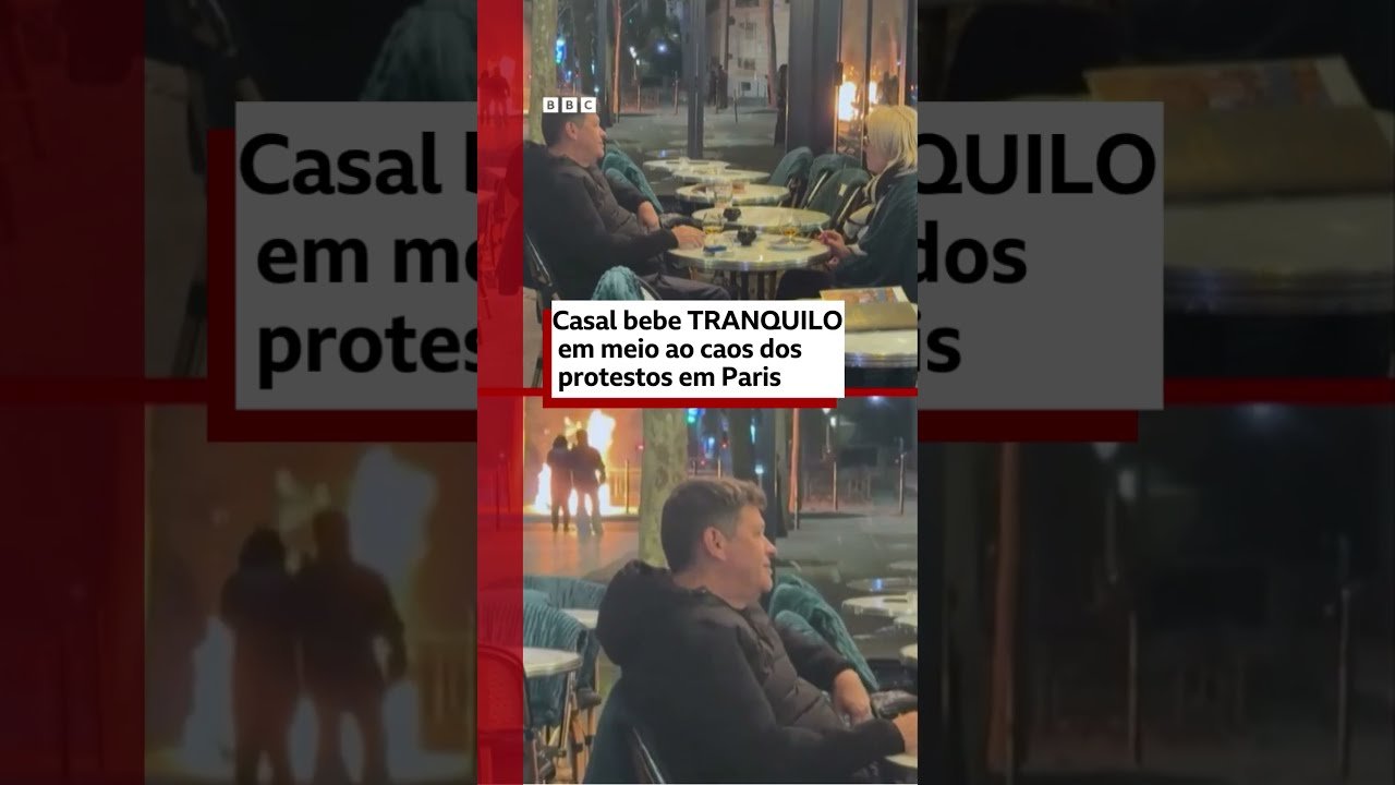 Casal bebe tranquilo em meio a caos dos protestos em Paris